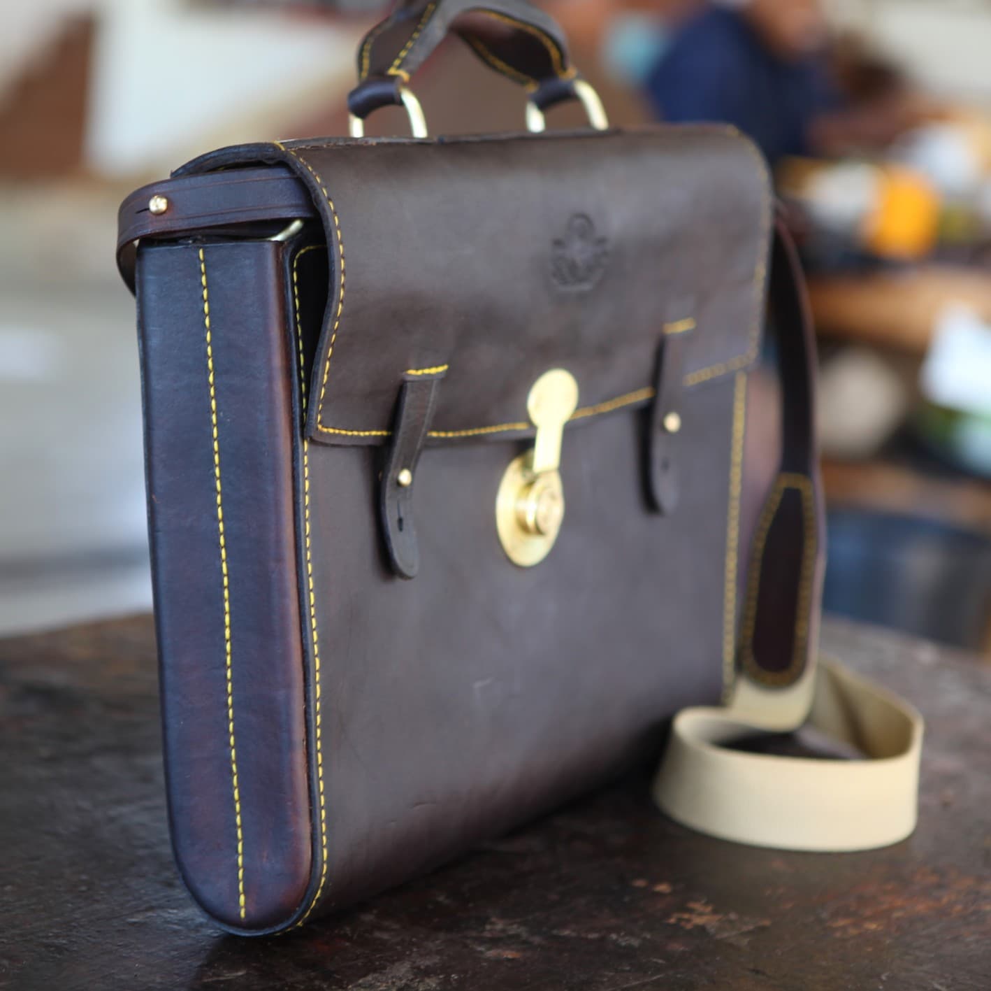 Hand stitching and brass hardware on a Johannesburg leather briefcase