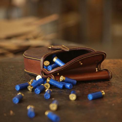 The King William's Town Cartridge Bag, blue bullets, cartridges, leather product, handcrafted, yellow stitching, brass studs