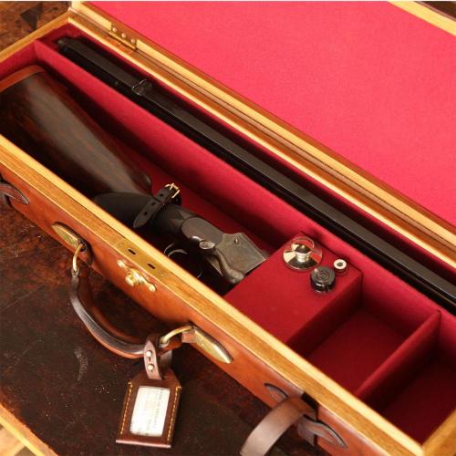 The Matjiesfontein Oak & Leather Gun Case, brass finishes, red suede, leather product, leather handle, leather tag, gun, gun case, handcrafted