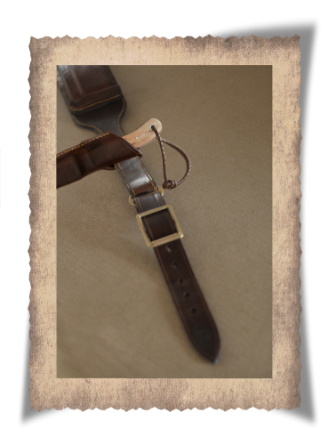 The Cradock Culling Belt, brass buckle, leather product, logo, holes, yellow stitching, handcrafted, knife sheath