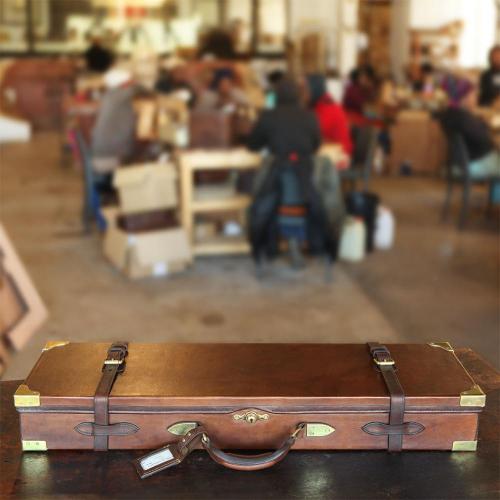 The Matjiesfontein Oak & Leather Gun Case, brass finishes, workshop, leather tag, leather handle, leather product, handcrafted