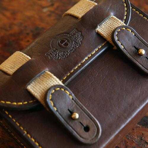 The Barkly Cartridge Storage Pouch, leather pouch, brass studs, canvas strap, embossing, logo, yellow stitching, leather merchant, leather merchants