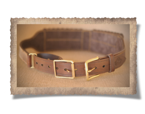 The Cradock Culling Belt, brass buckle, leather product, logo, holes, yellow stitching, handcrafted