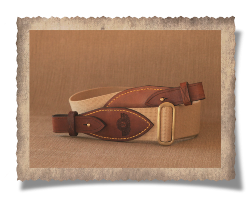 The Nieu-Bethesda Big Bore Rifle Sling, leather products, cotton canvas strap, logo, brass studs, logo