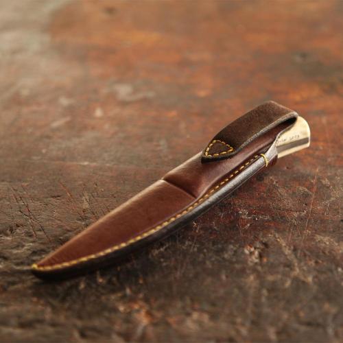 The Jagersfontein Custom Knife Sheath, leather product, yellow stitching, knife